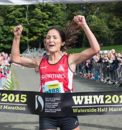 2015 Womens' winner Catherine Whoriskey from City of Derry Spartans crosses the line last year. (Picture Martin McKeown. Inpresspics.com.)