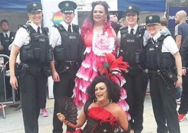 PSNI officers pictured with some of the people who took part in the parade at Foyle Pride in Derry.