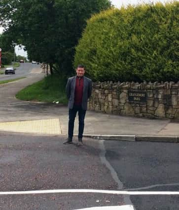 Sinn Fein Councillor Colly Kelly pictured outside Grangemore.
