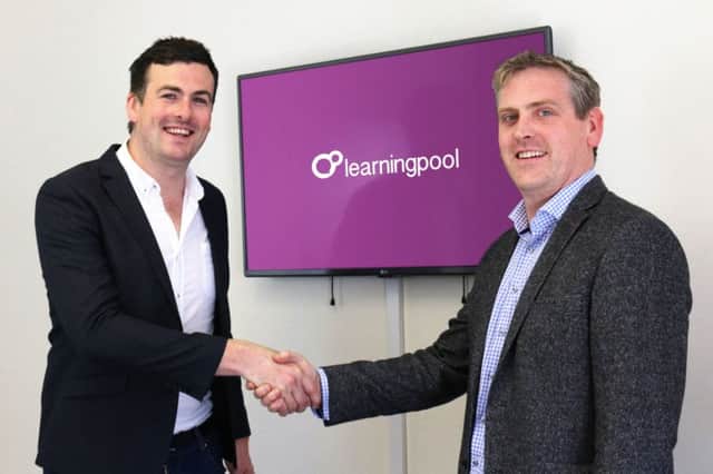 Paul McElvaney (on right), CEO, Learning Pool, with Sean Reddington, Managing Director, Mind Click.