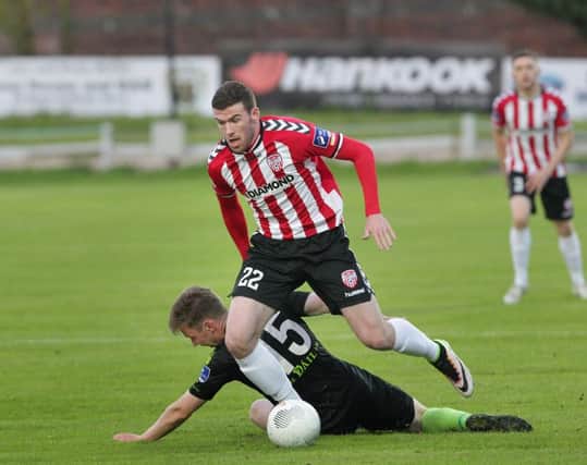 Derry City's Patrick McClean with Conor Melody of Galway United at the Brandywell on Friday night. Picture by Margaret McLaughlin.