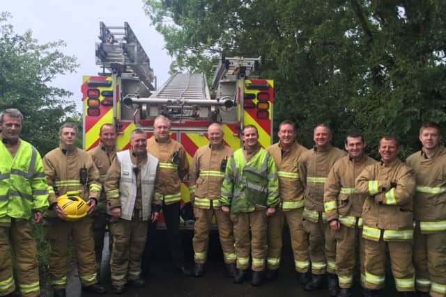 LAST CALL ... Colm ( 5th from left) with the Dungiven crew and Green watch, Crescent Link.
