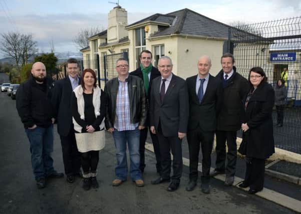 Pictured in 2015, Former Transport Minister, Danny Kennedy MLA, and Foyle MLA  (former Environment Minister) Mark H Durkan MLA, pictured with representatives of Groarty Integrated Primary School, from left, Dan Donnelly, Councillor John Boyle, Charmaine Harkin, Kieran Doran, Nick Tomlinson, Principal, Gordon Elder, Chair of the Board of Governors, and Shannon Browne, WELB. DER0615-101KM