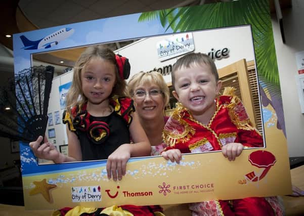 The Mayor of Derry City and Strabane District Council, Alderman HIllary McClintock pictured at City of Derry Airport on Thursday for the launch of Thomson's new City of Derry to Majorca route. Included are local children Leyton (4) and Amaira (6) Shongo.