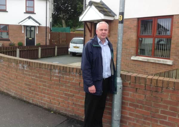 Sinn Fein councillor Dermot Nicholl, pictured at Hawthorn Park, Greysteel, hopes the lights will soon be repaired.