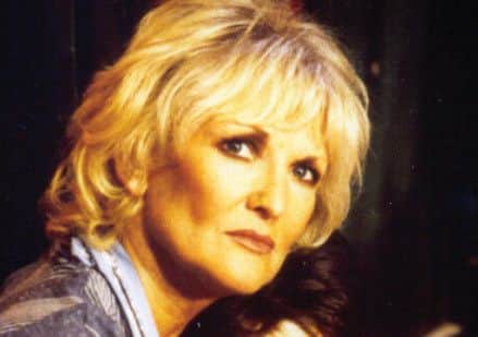 Lynn Paul as Mrs J.
