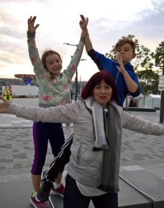Ryan pictured with his sister Sophia and his mother Nicola during a recent trip to Derry.