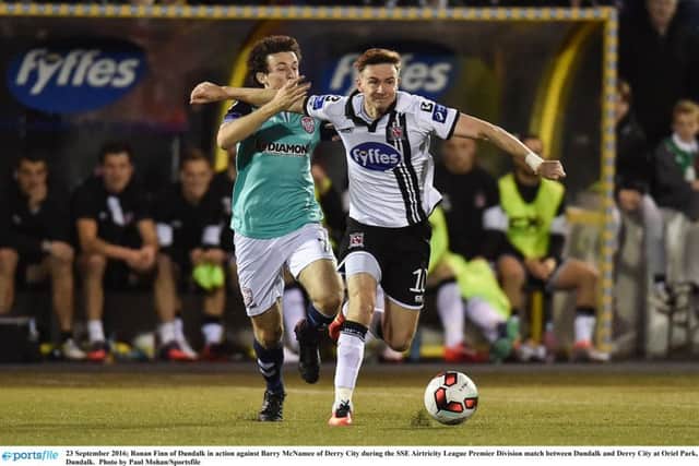 Ronan Finn of Dundalk in action against Barry McNamee of Derry City during the SSE Airtricity League Premier Division match between Dundalk and Derry City at Oriel Park.