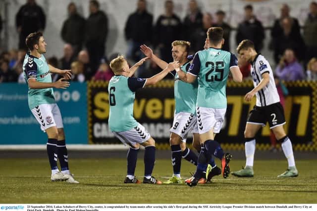 It had all started so well at Oriel Park as Lukas Schubert celebrates with his teammates after opening the scoring in the sixth minutes.