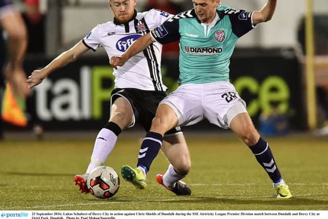 Lukas Schubert of Derry City in action against Chris Shields of Dundalk during the SSE Airtricity League Premier Division match between Dundalk and Derry City at Oriel Park, Dundalk.