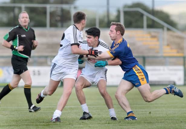 Niall Keenan, in action here against Neil Forrester of Steelstown, was superb as the St. Malachy's secured a spot in the Derry Intermediate Final. (Picture Margaret McLaughlin)
