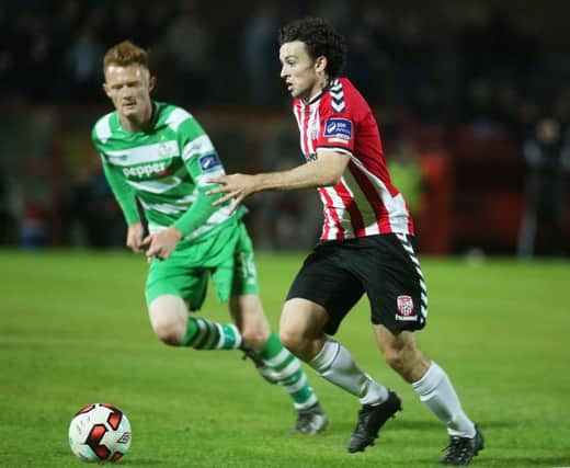 Derry's Barry McNamee and Shamrock Rovers' Gary Shaw during the 2-2 draw at Brandywell.
 Photo Lorcan Doherty / Presseye.com