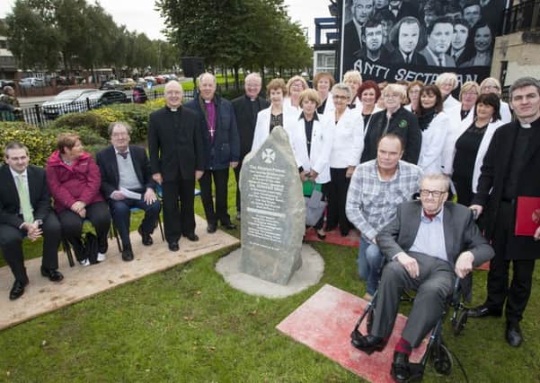 Group pictured on Tuesday afternoon at the Dr. Edward Daly monument at Glenfada Park for the Prayer and Healing Service. DER4016MC001