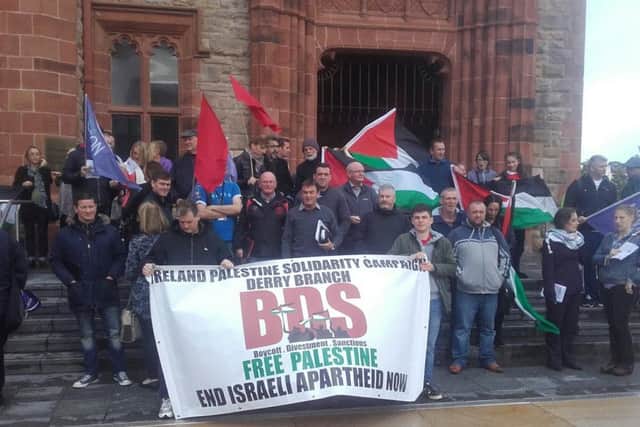 A section of the crowd protesting outside the Guildhall ahead of the Full Council meeting on Thursday afternoon.