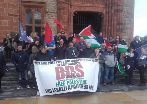 A section of the crowd protesting outside the Guildhall ahead of the Full Council meeting on Thursday afternoon.
