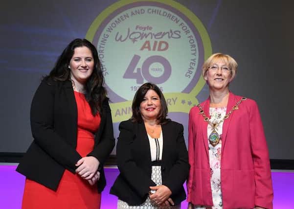 The Justice Minister Clare Sugden, Director of Foyle Women's Aid Marie Brown and the Mayor of Derry and Strabane District Council Hilary McClintock.