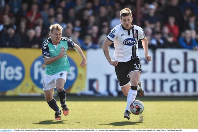 Patrick McEleney of Dundalk in action against Conor McCormack of Derry during the Irish Daily Mail FAI Cup Semi-Final match between Dundalk and Derry City at Oriel Park.
