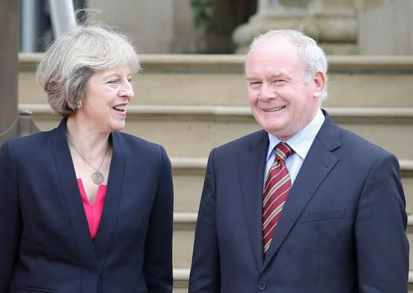 Prime Minister Theresa May pictured with deputy First Minister Martin McGuinness at Stormont Castle, Belfast, during her first official visit to Northern Ireland back in July. (Photo by Jonathan Porter / Press Eye)