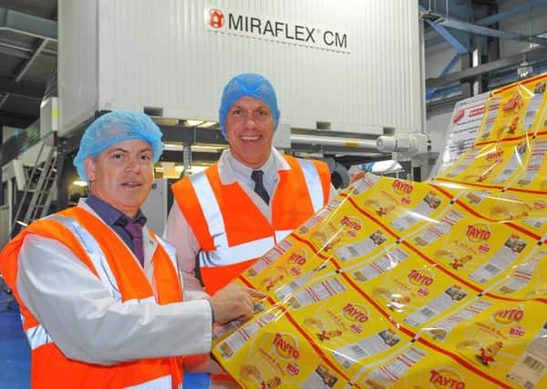 Boran-Mopack has invested Â£2.4million and created ten new jobs in Strabane to position the business for further export growth. Pictured (left) is John Hood, Invest NI, with Mairtin Boran, MD Boran-Mopack.