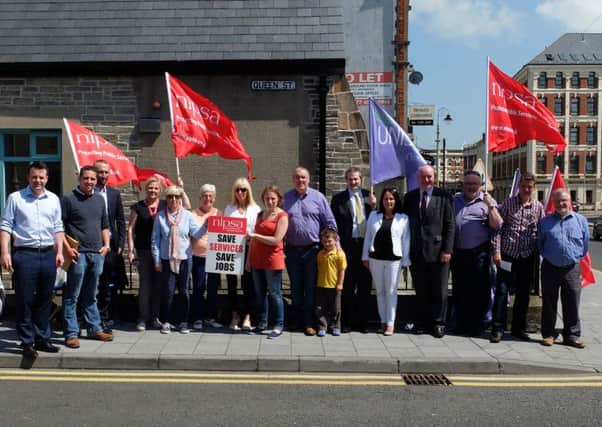 People pictured at strike outside of the Electoral Office in Derry in June.