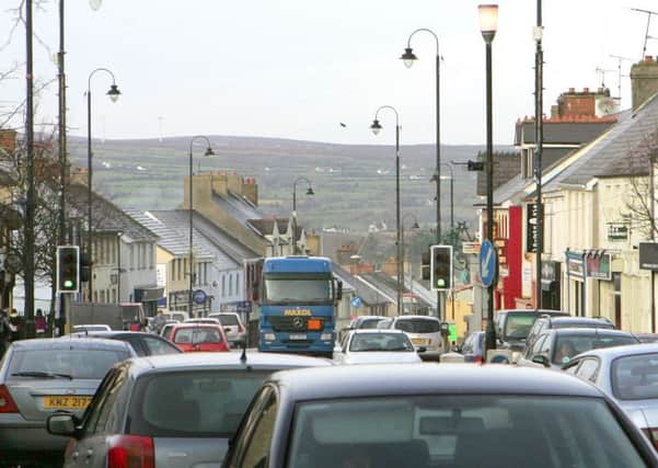 Traffic on Dungiven Main Street. LV3-708MML (file pic)