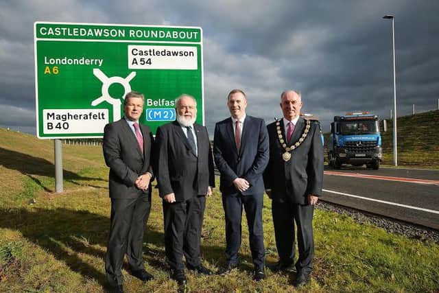 Infrastructure Minister Chris Hazzard with Conor Loughery, Transport NI Divisional Manager, Francie Molloy (MP), and Chair of Mid Ulster Council Trevor Wilson. Photo by Kelvin Boyes / Press Eye.
