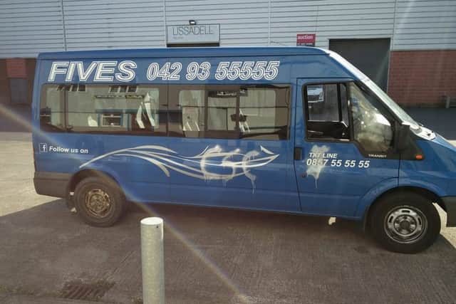 The driver side window was smashed in and the vehcile graffitied.