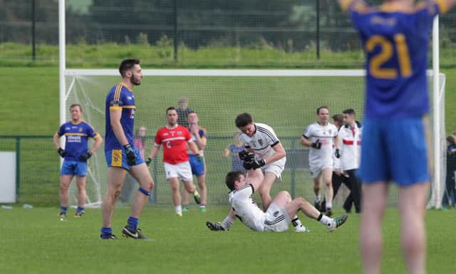 Despair for Steelstown on the final whistle against Castledawson in the Derry Intermediate Championship Football Final at Owenbeg on Sunday. Picture Margaret McLaughlin