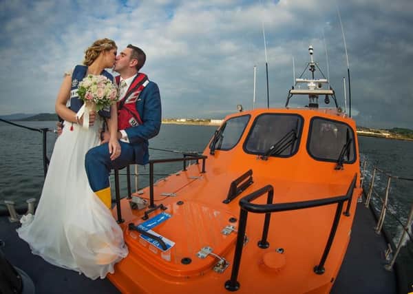 The newly-married couple, pictured on the Lough Swilly RNLI lifeboat, before the sea emergency. Picture: Jay Doherty Photography