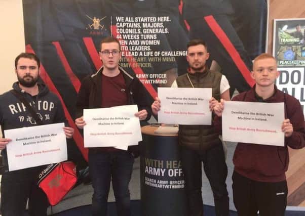 Derry  activist Aaron MacDaibhÃ©id (far left) with members of Sinn FÃ©in  at Queens University.