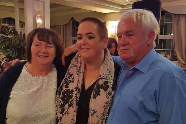 Dympna and Jerry Canning with their daughter, Angela after she had her head shaved for charity.