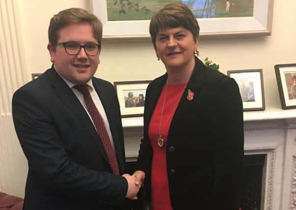 Aaron Callan with party leader Arlene Foster. INLS 45-704-CON