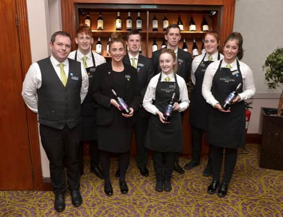 Everglades Hotel staff on duty at the annual Spanish themed wine and dinner evening  on Tuesday last. From left Paul Sproule, Aaron Quigley, Jennifer Young, JP McCafferty, Sarah Mitchell, Chris Rankin, Orla McCloskey and Rossana De Bartowlomeo. DER4316GS008