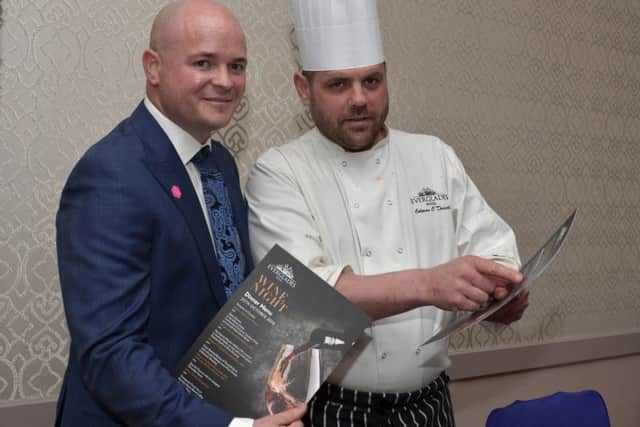 Everglades Hotel general manager and head chef Colman ODriscoll reviewing the menu for the annual Spanish themed wine and dinner evening on Tuesday last. DER4316GS010