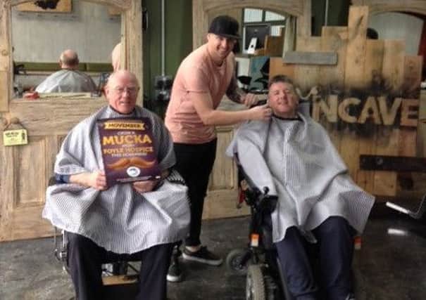 Warren Stevenson, Owner of the Mancave Barbers, with John Mann and Paul Loughrey.