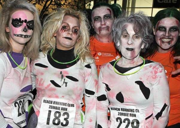 Some of the people who took part in the 5K Zombie Run in Derry on Sunday.