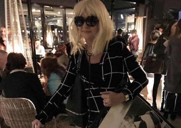The Bullitt Hotel in Belfast saw the funny side when this women turned up dressed as the person who attempted to steal a Steve McQueen worth Â£15,000 from the hotel earlier this month. (Photo: Courtesy of The Bullitt Hotel, Belfast)