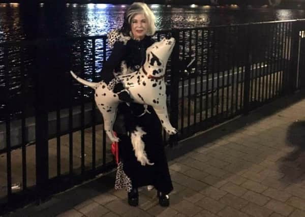 Sharon Meakin pictured as Cruella de Vil for Hallowe'en in Derry on Monday.
