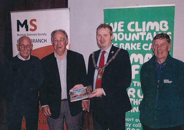 Terry McNamee, MS Society; Nelson McGonagle; James McCorkell, deputy mayor, Causeway Coast & Glens and Malcolm Stuart, Macmillan Cancer.