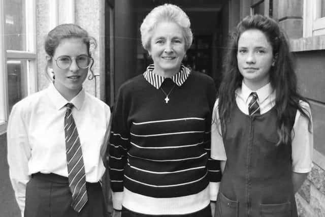 Sister Paula, Head of Irish at Thornhill College, with pupils Eadaoin Patton and Wendy McGlinchey, who took first and second place respectively in an Irish short story competition organised by the Belfast-based publishing house, Na Daoine Beaga.