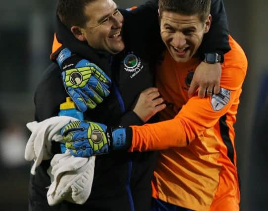 Linfield manager David Healy celebrates at the final whistle with stand-in goalkeeper, defender  Mark Haughey, after Saturday's 2-2 draw against Glenavon. ( Picture by Brian Little/Press Eye)