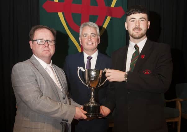 Former Pupil of St. Joseph's and former Editor of the Derry Journal, Mr Eamon Sweeney (guest speaker) and Mr Damien Harkin (Principal) pictured with Head Boy Harry Curran who received awards for Post 16 Maths, Step-Up Science & 6th Form Pupil of the Year