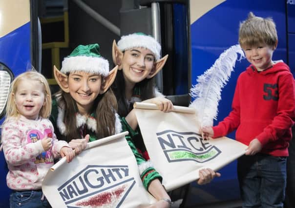 Nyla and Colby Kaminski are pictured alongside Sean Brown, Ulsterbus Inspector, Roseanne Sturgeon, Young at Art and Santas little elves.  To coincide with this years Christmas lights switch-on, Translink and Young at Art will be hosting a special Santa letter writing workshop in Foyle Street Bus Station on 17th November.