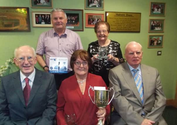 Pictured, standing, from left to righ, David McLaughlin, BT and May Burton Highly Commended; front row, from left to right, Albert Smallwoods, Noreen Arnold (winner) and Roger ODoherty