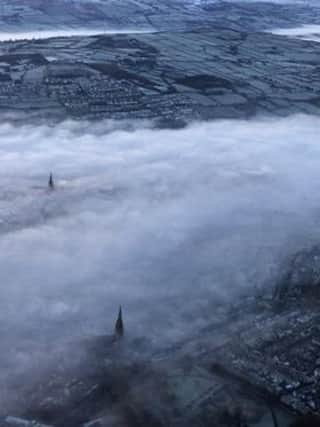 The Cathedral spires pierce through the frozen fog over Derry this morning. (Pic by Cheryl-Ann Elsie)