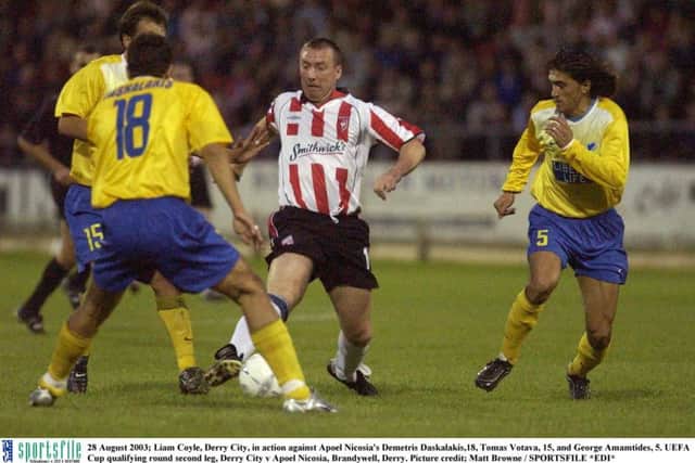 Liam Coyle, Derry City, in action against Apoel Nicosia's Demetris Daskalakis,18, Tomas Votava, 15, and George Amamtides, 5 in the UEFA Cup qualifying round second legat Brandywell on 28 August 2003;