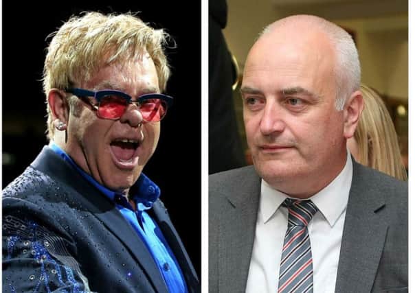 Elton John (left) and DUP MLA for South Antrim, Trevor Clarke.