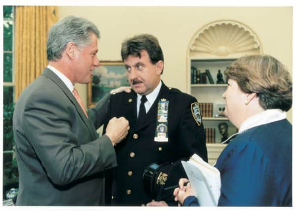 Denis Mulcahy with President Bill Clinton at the White House in the early 1990s.