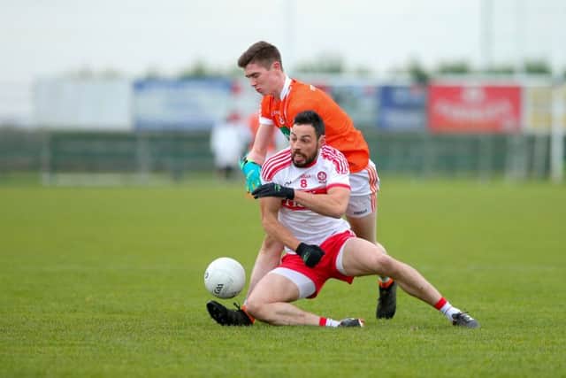 Armagh's Ben Crealey and Derry's Aidan McLaughlin tangle in Crossmaglen.

(Picture: Philip Magowan / PressEye).