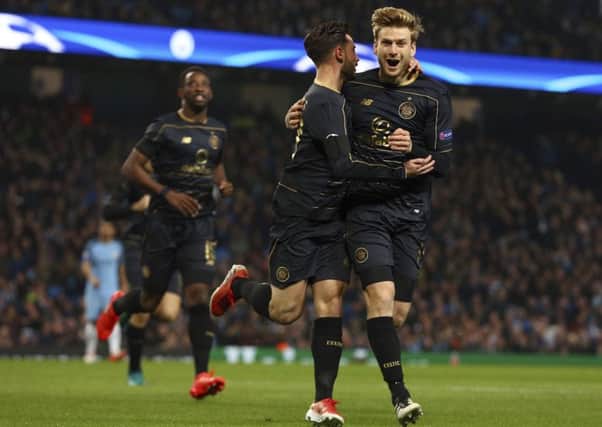 Patrick Roberts, pictured centre, scored for Celtic at the Etihad